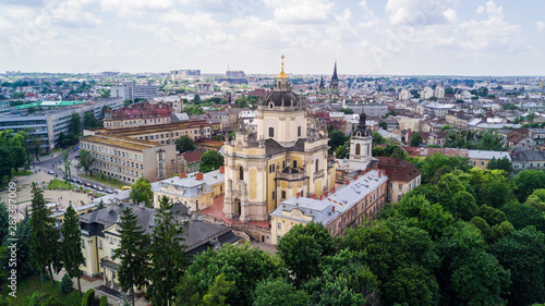 Aerial view of Lviv old european city with red roofs. city hall tower. copy space © F8  \ Suport Ukraine