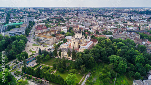 Aerial view of Lviv old european city with red roofs. city hall tower. copy space