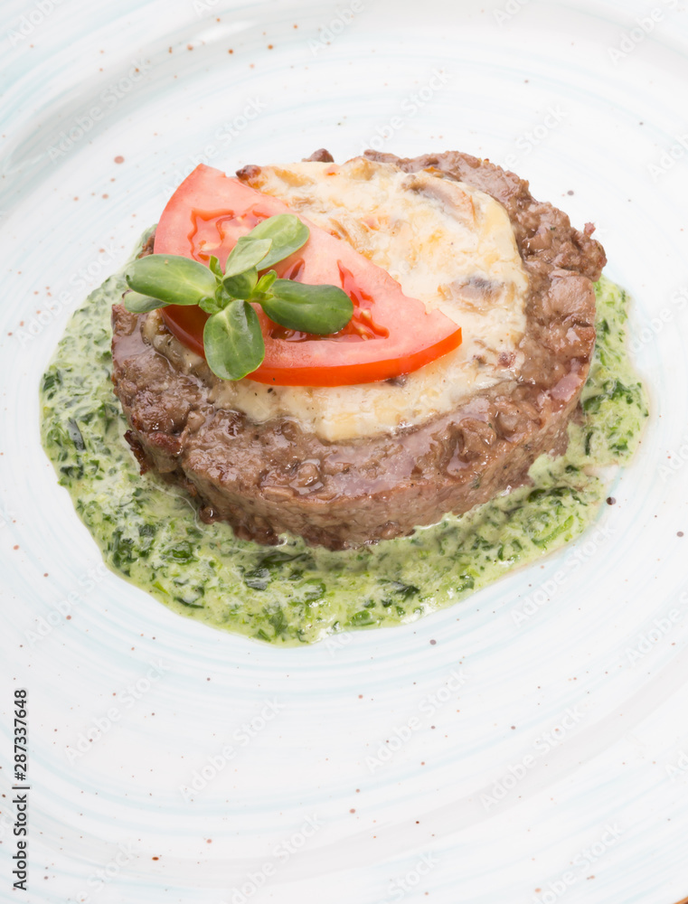 Prepared minced beef meat cutlet with spinach Prepared minced beef meat cutlet with spinach