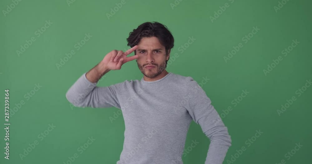 Young man appearing dancing and disappearing over green screen Young man appearing dancing and disappearing over green screen