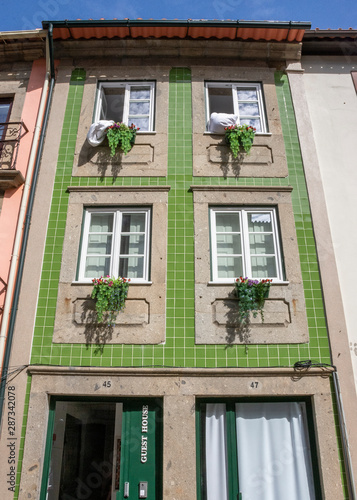 Green Tiled Apartment With Four Windows in Braga, Portugal