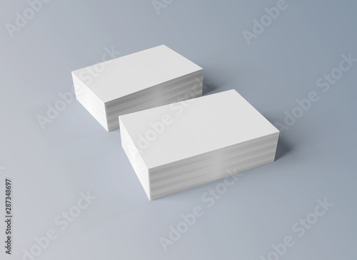 Stack of white business cards mockup isolated on grey 3d rendering