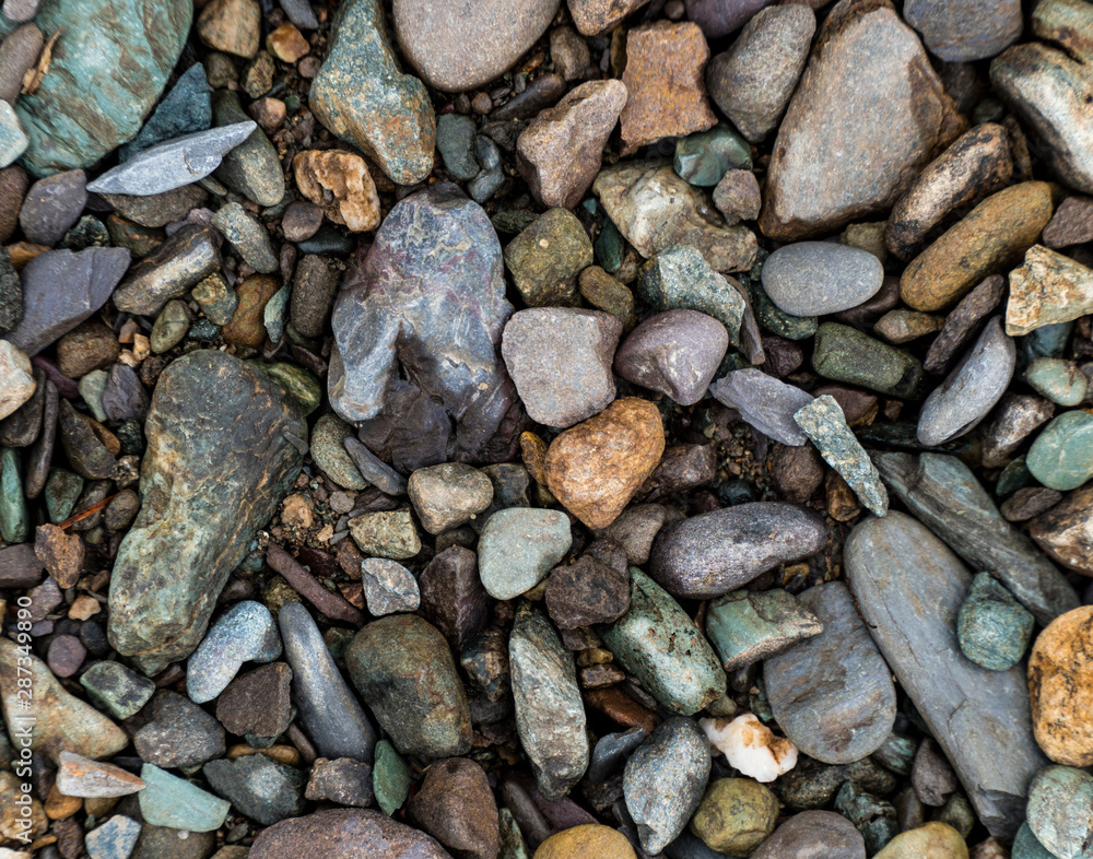 The texture of a shallow river stone. Pebble Background Image The texture of a shallow river stone. Pebble Background Image