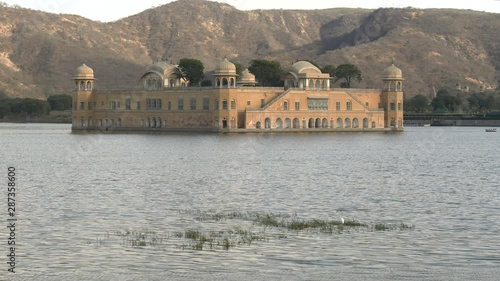 afternoon view of jal mahal palace and lake in jaipur, india photo