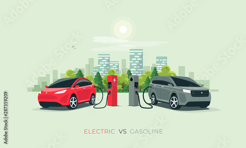 Comparing electric versus gasoline diesel car suv. Electric car charging at charger stand vs. fossil car refueling petrol gas station. Front perspective view. City building skyline in background.