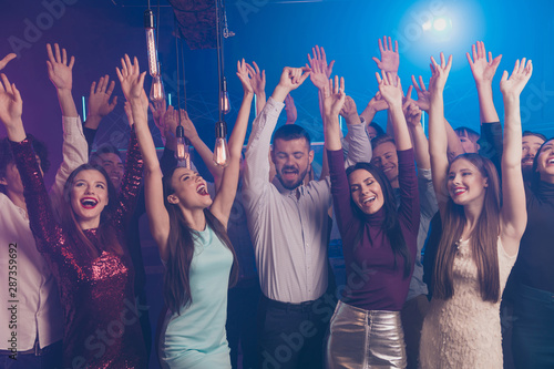 Portrait of content charming attractive lady youth guy raise hands arms scream shout hear favorite song chill singer indoors discotheque formal wear formalwear indoors trendy stylish