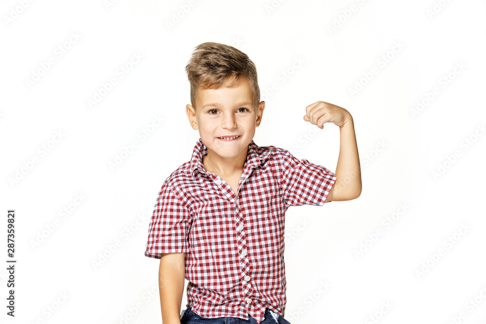 handsome boy shows his strength on white background handsome boy shows his strength on white background