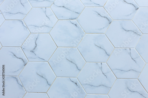 White hexagon marble tile wall for texture background .