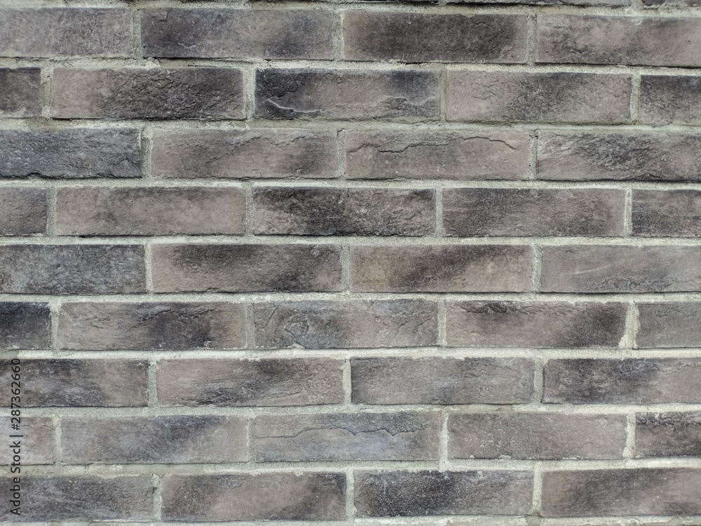 Gray brick wall. Construction material texture.