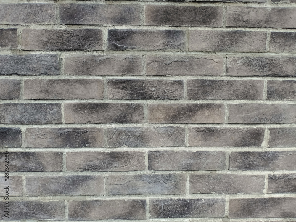 Gray brick wall. Construction material texture. Gray brick wall. Construction material texture.