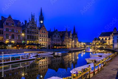 View of Graslei, Korenlei quays and Leie river in the historic city center in Ghent (Gent), Belgium. Architecture and landmark of Ghent. Night cityscape of Ghent. © Ekaterina Belova