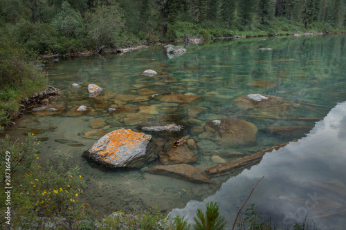 reflection at mountain s lake of kalagash valley