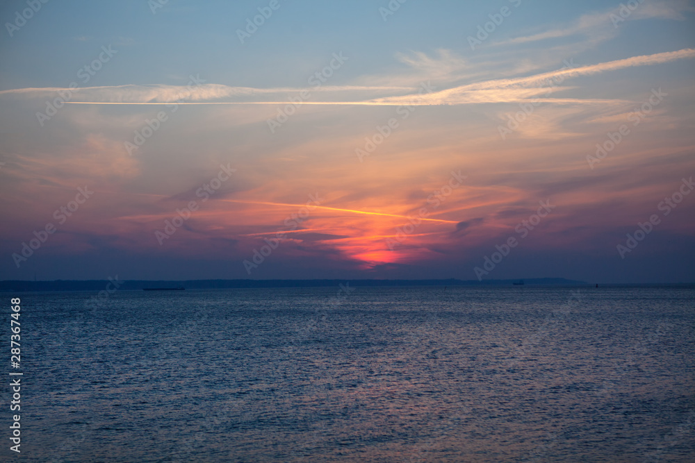 fantastic sunset over the calm sea
