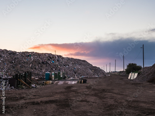 Early morning at a recycling dump