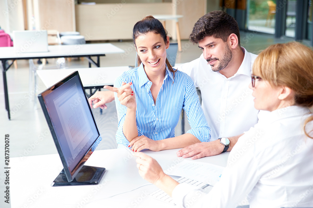 Insurance agent businesswoman consulting with young couple in the office Insurance agent businesswoman consulting with young couple in the office