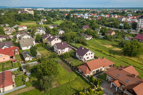 Aerial view of a residential area in a town with private houses.