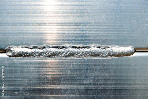 Extreme macro shot of welded aluminum composite material