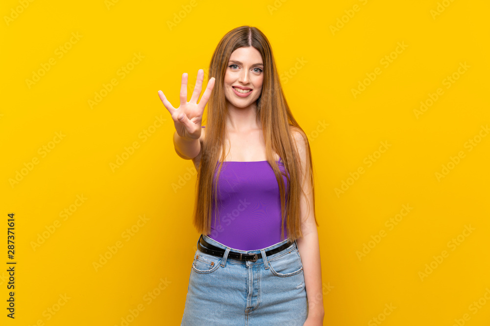 Young woman over isolated yellow background happy and counting four with fingers Young woman over isolated yellow background happy and counting four with fingers