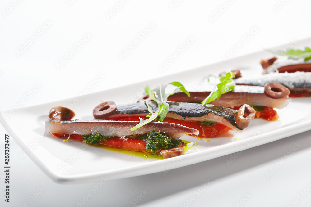 Sardines with tomatoes and kalamata olives Sardines with tomatoes and kalamata olives