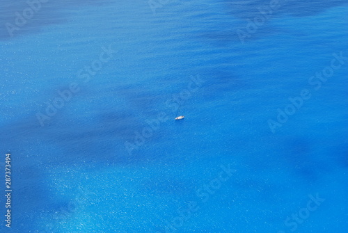 Single boat in the Aegean sea