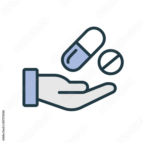 Hand with prescription drugs - pill tablets & capsules