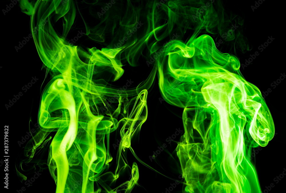 Green smoke on black background Green smoke on black background
