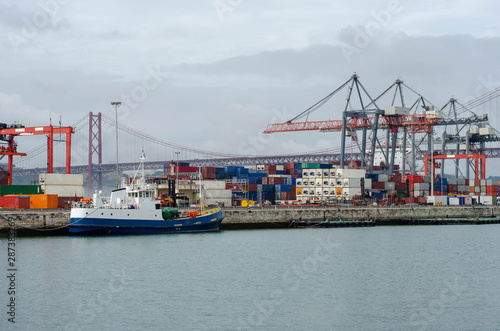 Container ship port of Lisbon on a Tagus river