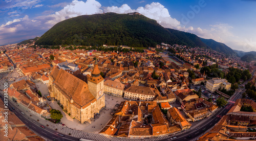 Brasov cityscape with black cathedral and mountain on backround in Romania. Aerial view