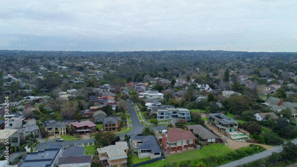 Backward flight over luxury homes along Mornington Peninsual coastline in Australia Backward flight over luxury homes along Mornington Peninsual coastline in Australia
