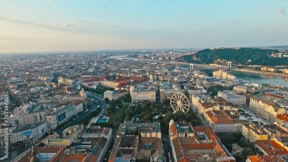 Aerial View of Budapest Eye Ferris Wheel in Budapest Hungary, drone ascending Aerial View of Budapest Eye Ferris Wheel in Budapest Hungary, drone ascending