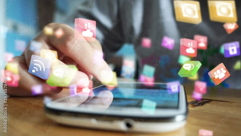 Hand using smartphone with social media icons	