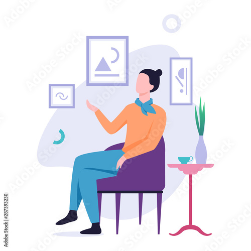 Man sitting around the painting on the wall