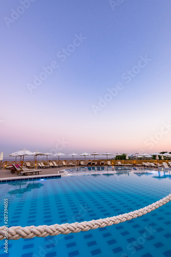 Luxury Swimming Pool at Sunrise in Hotel Resort, Rhodes, Greece