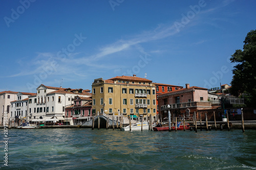 historic facades of old houses on the Grand canal in Venice © Sergey