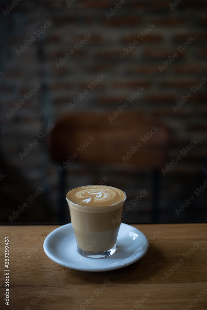 Fototapeta premium coffee latte art in coffee shop