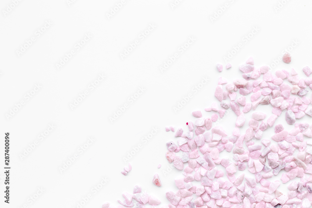 Obraz premium design with pebble on white background top view space for text