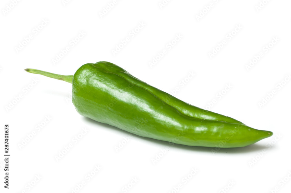 Closeup of organic green pepper on white background Closeup of organic green pepper on white background