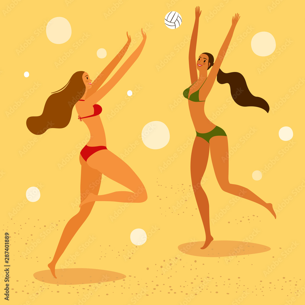 Beautiful women playing volleyball on a sunny beach.