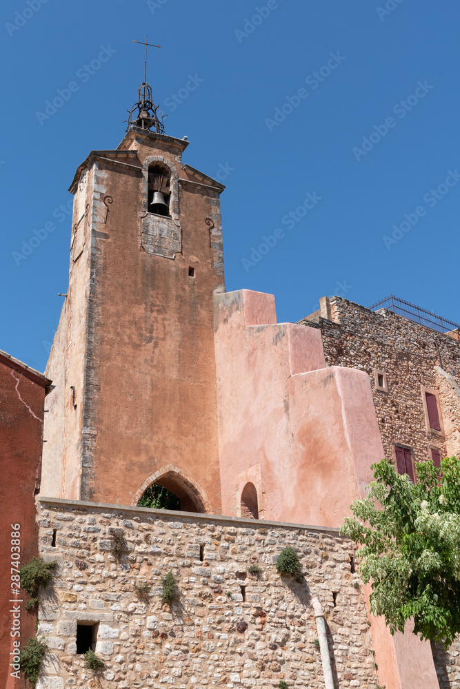 Beautiful colorful church in the small French village of Roussillon