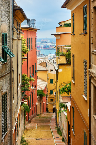 Fototapeta Naklejka Na Ścianę i Meble -  Old narrow street in Genoa