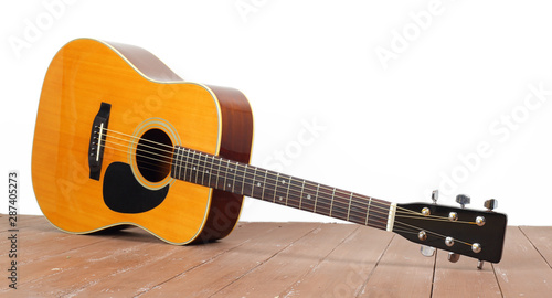 Musical instrument - Classic acoustic guitar wood and white background