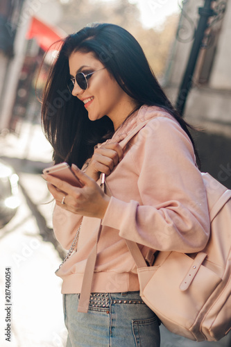 Beautiful model posing for the camera on the streets.