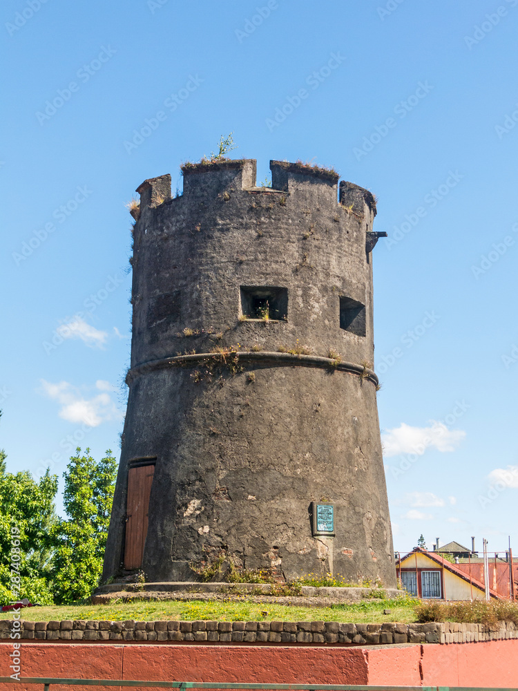 Historic torreon of Valdivia city. Historic torreon of los canelos with blue clear sky in Valdivia, Chile Historic torreon of Valdivia city. Historic torreon of los canelos with blue clear sky in Valdivia, Chile