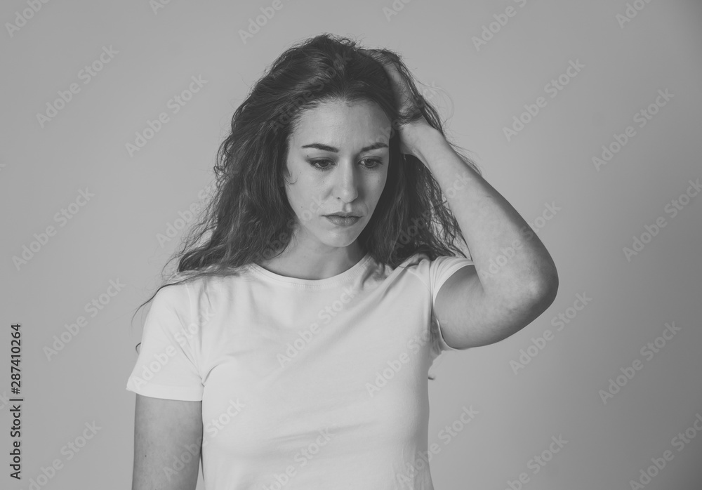 Portrait of sad and depressed woman feeling upset and distressed. Human expressions and emotions - obrazy, fototapety, plakaty 