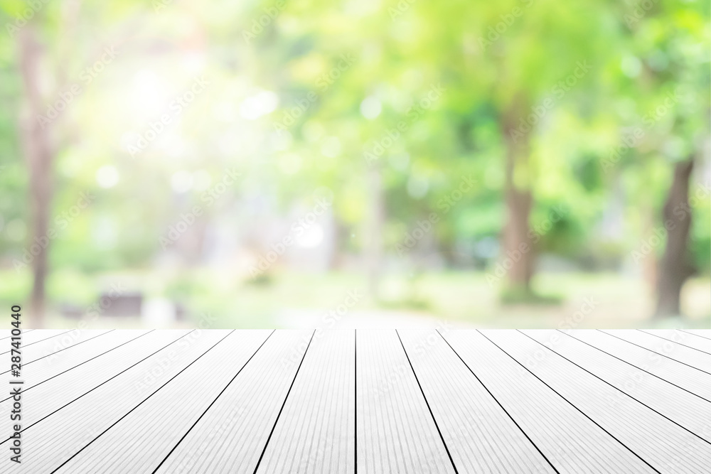 Empty wooden table with party in garden background blurred. Empty wooden table with party in garden background blurred.