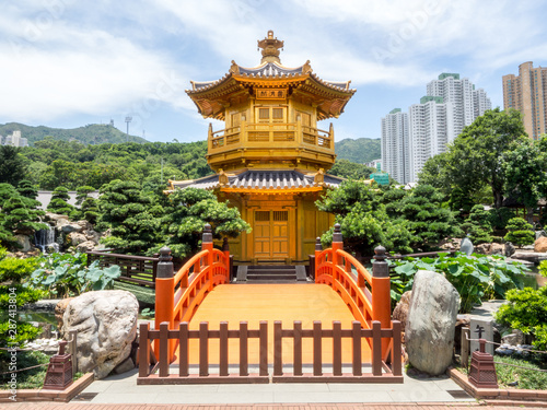 Nan Lian Gardens Gold Leaf Pagaoda with Colour Orange Bridge over Calm River Surrounded by Trees