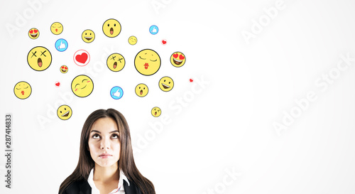 Portrait of attractive businesswoman with smileys