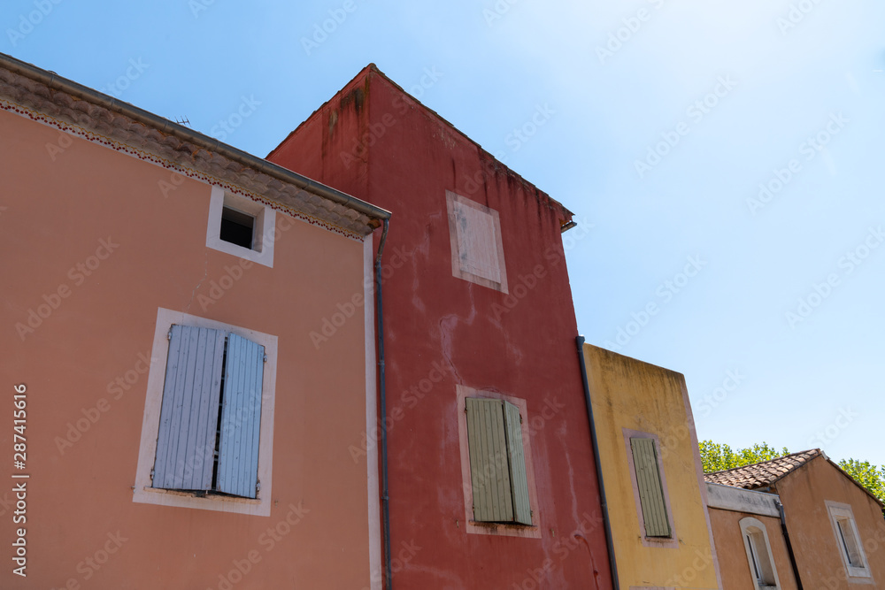 Colorful street houses in Roussillon Provence France