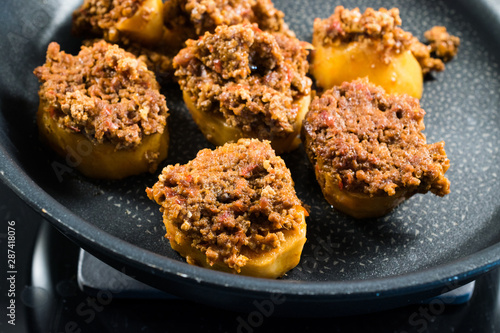 Turkish Food Baked Potato Casserole with Minced Meat in Pan  Patates Oturtma. photo