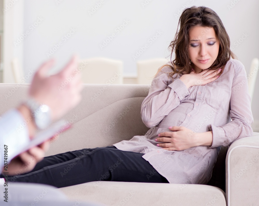Pregnant woman visiting psychologist doctor Pregnant woman visiting psychologist doctor